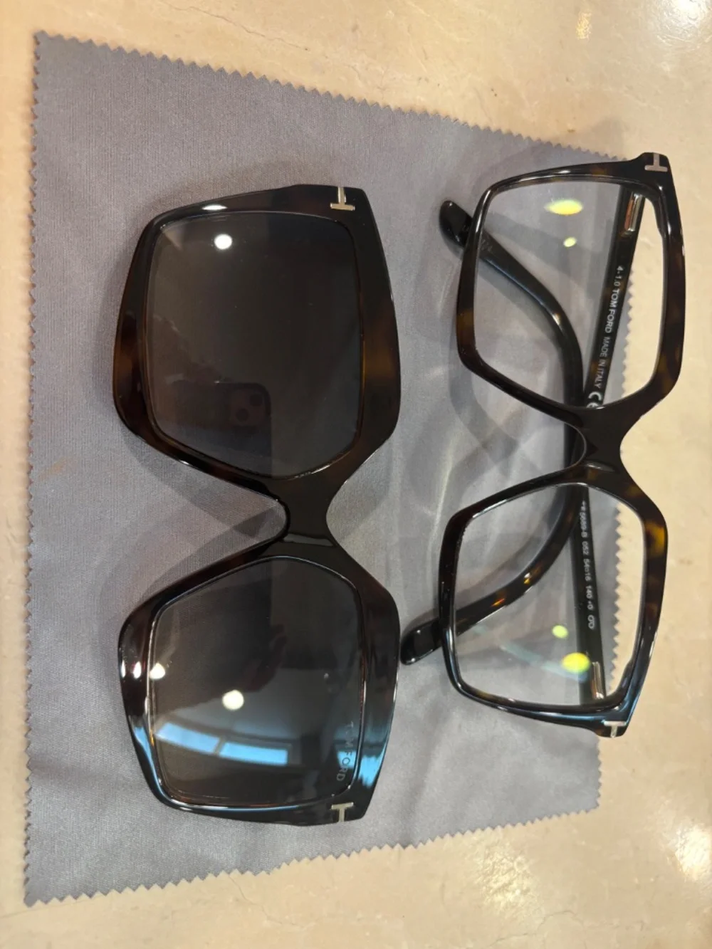 Lot of used Prada and Tom Ford glasses.